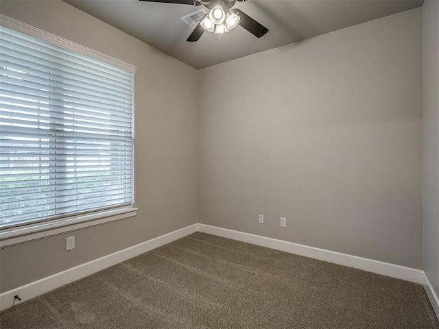11716 SW 47th St, Mustang, OK 73064 - empty room with ceiling fan and dark carpet