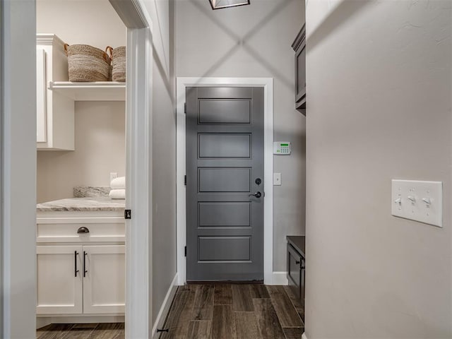 11716 SW 47th St, Mustang, OK 73064 - foyer with dark wood-type flooring and baseboards