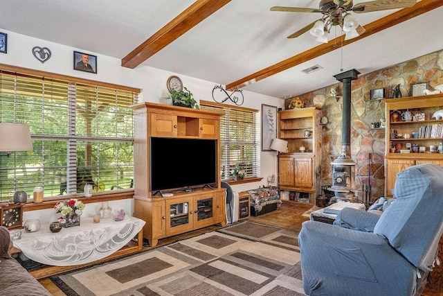 12333 E Tecumseh Rd, Norman, OK 73026 - living area featuring a wood stove and ceiling fan