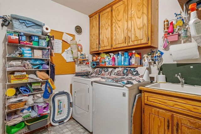 12333 E Tecumseh Rd, Norman, OK 73026 - laundry area featuring cabinet space and independent washer and dryer
