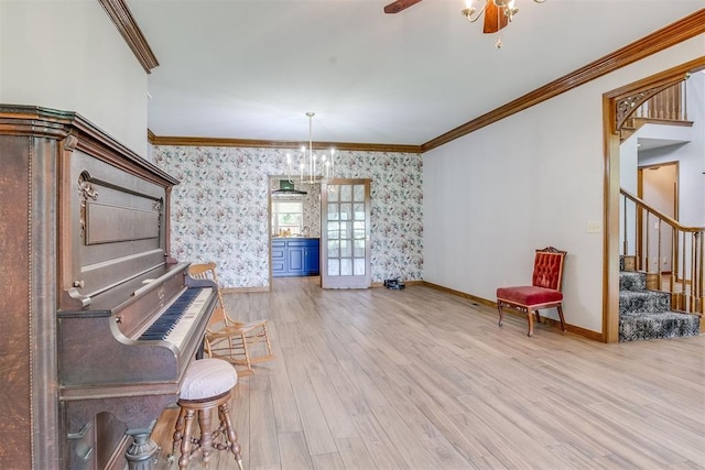 11748 SW 54th St, Mustang, OK 73064 - unfurnished room with ornamental molding, stairs, wallpapered walls, wood finished floors, and ceiling fan