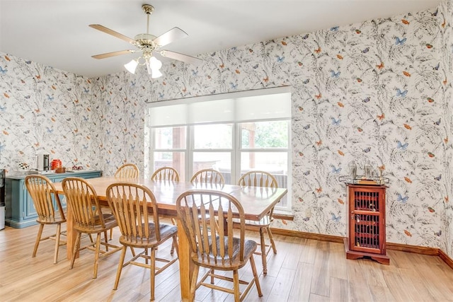 11748 SW 54th St, Mustang, OK 73064 - dining room featuring light wood-type flooring, wallpapered walls, and ceiling fan