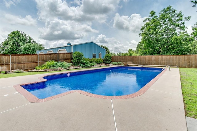 11748 SW 54th St, Mustang, OK 73064 - view of swimming pool with a fenced backyard and a patio area