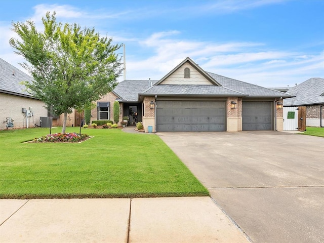 16117 Cale Dr, Edmond, OK 73013 - ranch-style house featuring an attached garage, concrete driveway, and brick siding