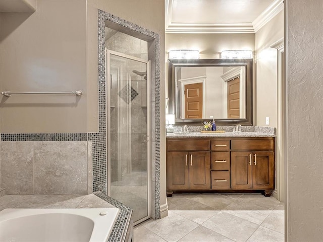 16117 Cale Dr, Edmond, OK 73013 - bathroom with a stall shower, ornamental molding, a bath, tile patterned flooring, and double vanity