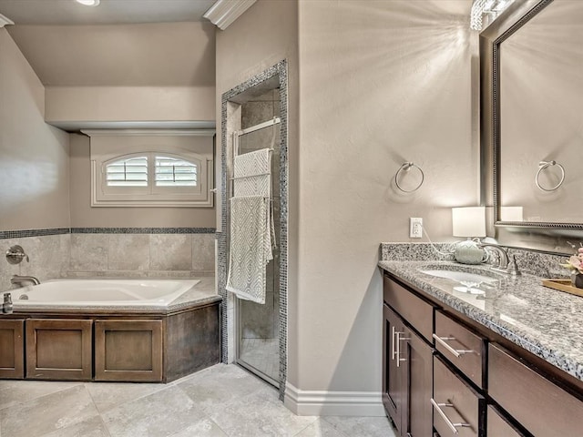 16117 Cale Dr, Edmond, OK 73013 - bathroom featuring a stall shower, vanity, a garden tub, and tile patterned flooring