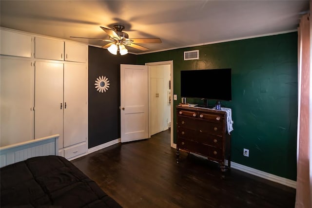 4117 NW 21st St, Oklahoma City, OK 73107 - bedroom with dark wood-style floors and a ceiling fan