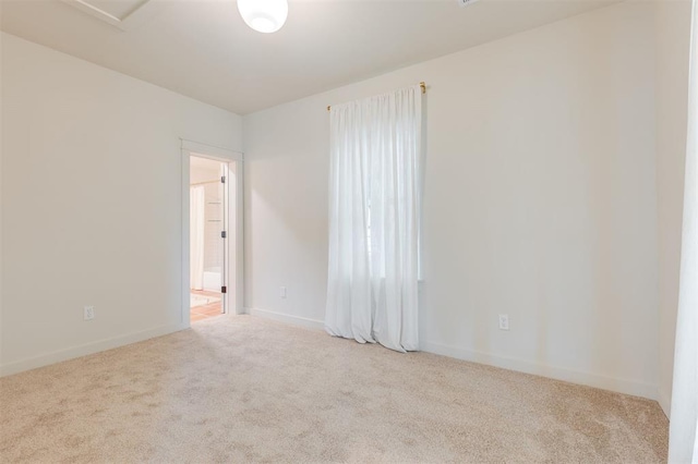 406 E Logan Ave, Guthrie, OK 73044 - carpeted empty room with baseboards