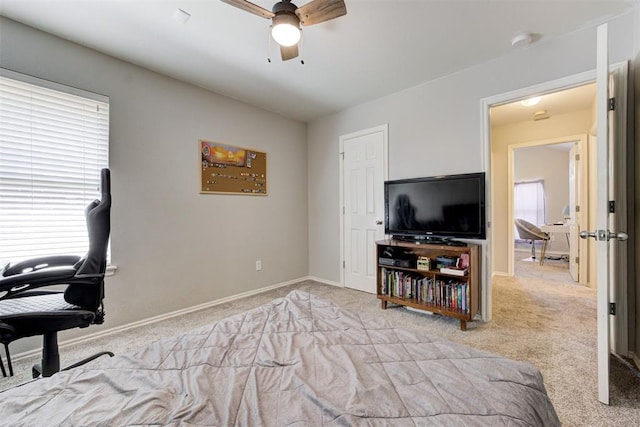 21854 Meadow Mist Cir, Edmond, OK 73012 - home office with light carpet and ceiling fan