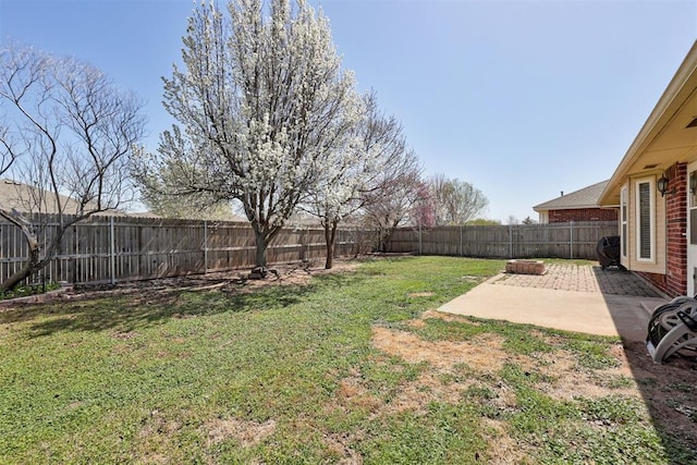 21854 Meadow Mist Cir, Edmond, OK 73012 - fenced backyard featuring a patio area