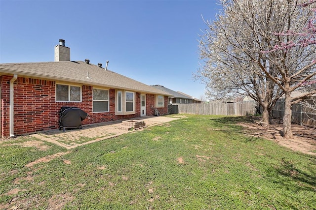 21854 Meadow Mist Cir, Edmond, OK 73012 - fenced backyard with a patio area