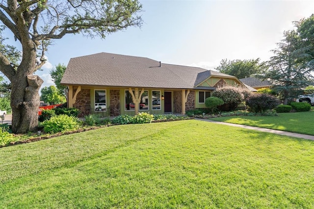 3425 Cheyenne Dr, Edmond, OK 73013 - view of front of property with stone siding and a front yard