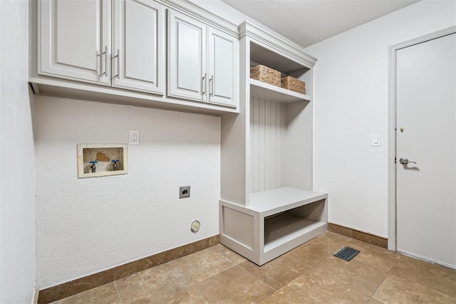3425 Cheyenne Dr, Edmond, OK 73013 - washroom with electric dryer hookup, washer hookup, and cabinet space