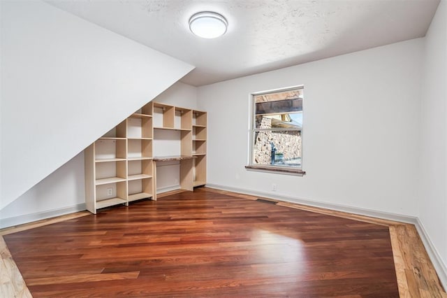 3425 Cheyenne Dr, Edmond, OK 73013 - bonus room featuring wood finished floors and baseboards