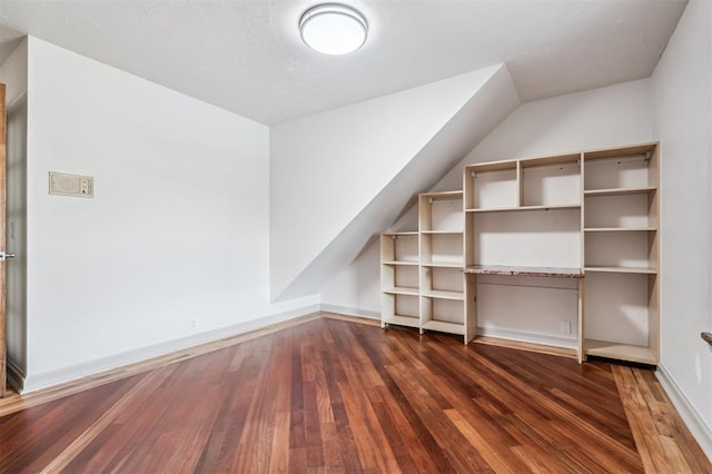 3425 Cheyenne Dr, Edmond, OK 73013 - bonus room featuring wood finished floors and vaulted ceiling