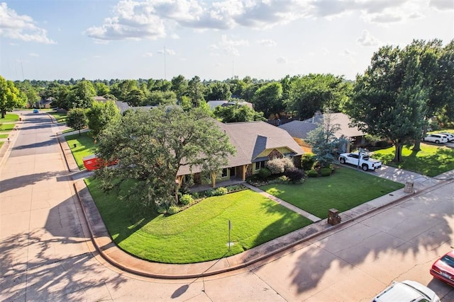 3425 Cheyenne Dr, Edmond, OK 73013 - view from above of property with a tree filled landscape
