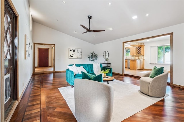 3425 Cheyenne Dr, Edmond, OK 73013 - living room featuring vaulted ceiling, a ceiling fan, wood finished floors, and recessed lighting