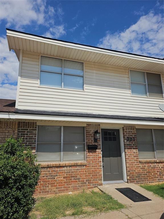 321 W 4th St, Hobart, OK 73651 - view of property with brick siding