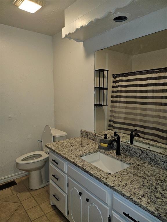 321 W 4th St, Hobart, OK 73651 - bathroom featuring vanity, tile patterned flooring, and curtained shower