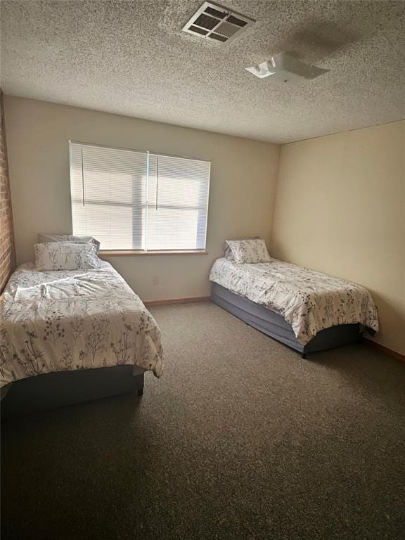 321 W 4th St, Hobart, OK 73651 - bedroom featuring carpet and a textured ceiling