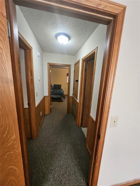 321 W 4th St, Hobart, OK 73651 - hallway with a textured ceiling