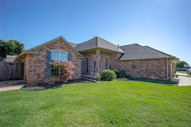 9124 SW 28th St, Oklahoma City, OK 73128 - view of front facade with brick siding and a shingled roof