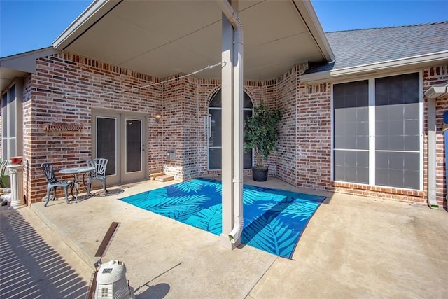 9124 SW 28th St, Oklahoma City, OK 73128 - view of swimming pool featuring a patio area and a covered pool