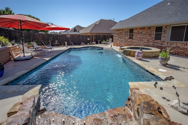 9124 SW 28th St, Oklahoma City, OK 73128 - view of pool with a patio, a fenced backyard, and a pool with connected hot tub