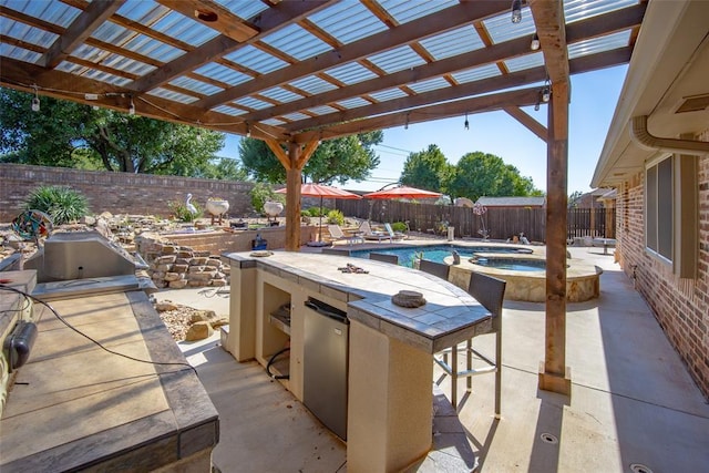 9124 SW 28th St, Oklahoma City, OK 73128 - fenced backyard with an in-ground hot tub, a patio, and a pergola