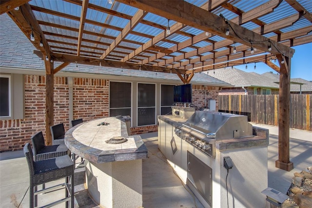 9124 SW 28th St, Oklahoma City, OK 73128 - view of patio with area for grilling and a pergola