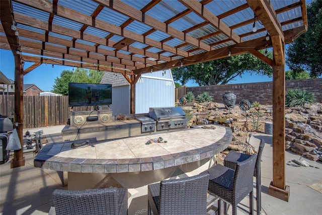 9124 SW 28th St, Oklahoma City, OK 73128 - fenced backyard featuring area for grilling and a pergola