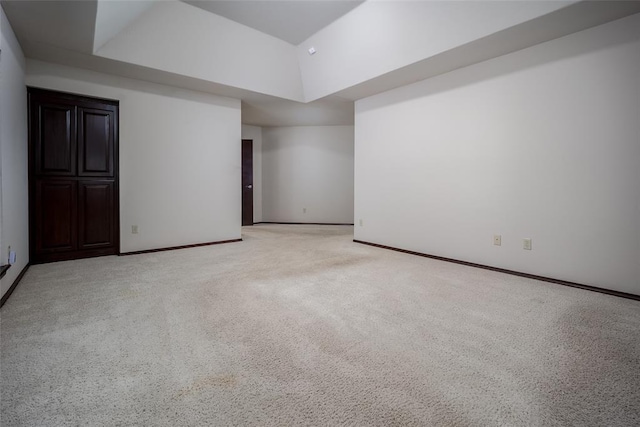 9124 SW 28th St, Oklahoma City, OK 73128 - unfurnished room featuring light colored carpet and high vaulted ceiling
