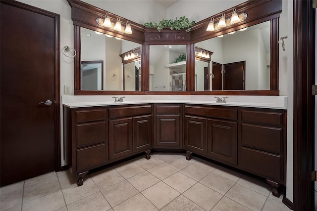 9124 SW 28th St, Oklahoma City, OK 73128 - full bathroom featuring tile patterned floors and double vanity