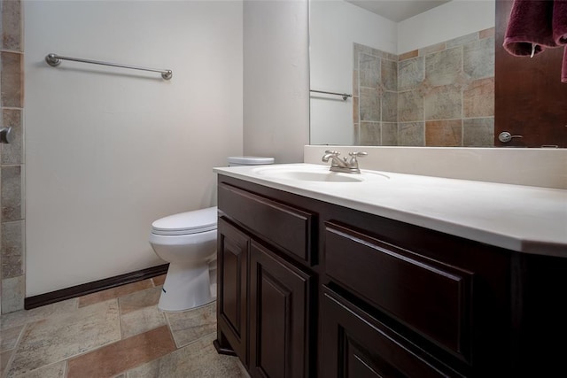 9124 SW 28th St, Oklahoma City, OK 73128 - bathroom featuring vanity and stone tile flooring