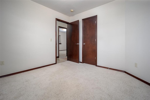 9124 SW 28th St, Oklahoma City, OK 73128 - empty room featuring light colored carpet and baseboards