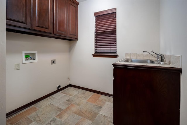 9124 SW 28th St, Oklahoma City, OK 73128 - laundry room featuring cabinet space, electric dryer hookup, light stone finish flooring, and hookup for a washing machine