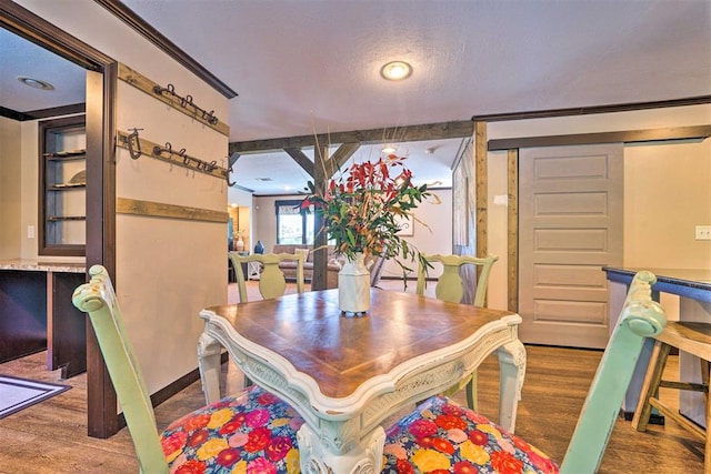 86 Crooked Oaks Ln, Broken Bow, OK 74728 - dining area with wood finished floors and a textured ceiling