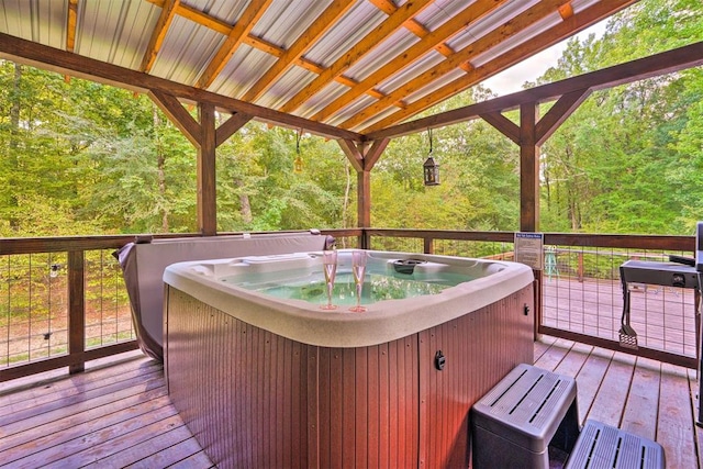 86 Crooked Oaks Ln, Broken Bow, OK 74728 - deck featuring a hot tub and a forest view