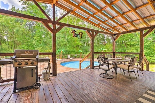 86 Crooked Oaks Ln, Broken Bow, OK 74728 - deck featuring area for grilling and outdoor dining area
