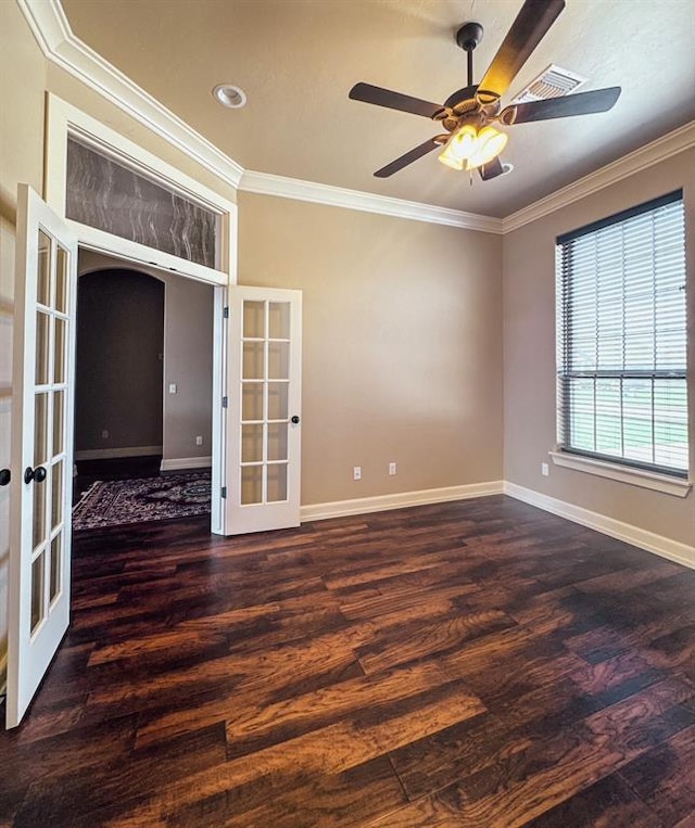 3000 Warwick Pl, Edmond, OK 73013 - empty room with french doors, crown molding, wood finished floors, and a ceiling fan