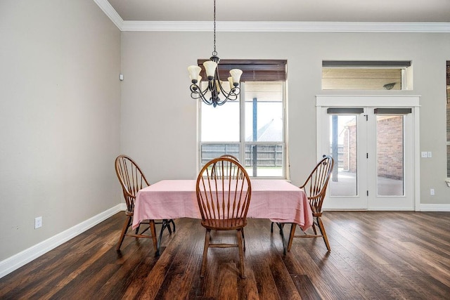 3000 Warwick Pl, Edmond, OK 73013 - dining space with ornamental molding, wood finished floors, and a chandelier
