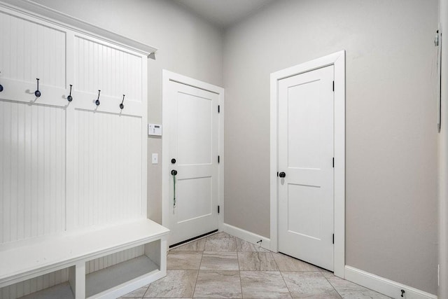 3000 Warwick Pl, Edmond, OK 73013 - mudroom featuring light marble finish flooring and baseboards