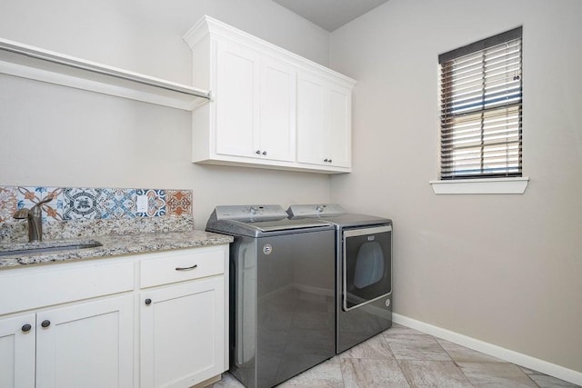 3000 Warwick Pl, Edmond, OK 73013 - laundry room with independent washer and dryer and cabinet space