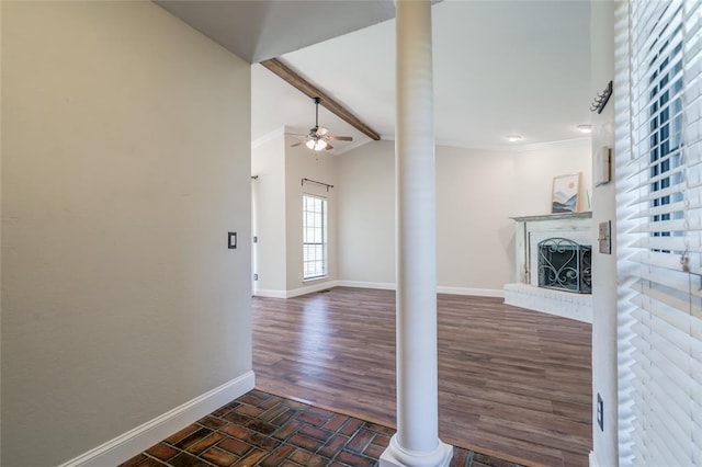16408 Del Mar Dr, Edmond, OK 73013 - hall featuring ornate columns and dark wood finished floors