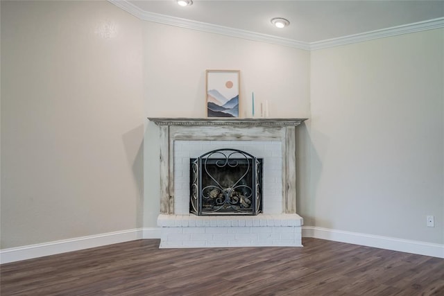 16408 Del Mar Dr, Edmond, OK 73013 - detailed view of crown molding, a brick fireplace, and wood finished floors