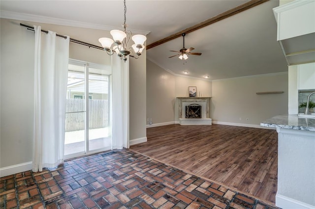 16408 Del Mar Dr, Edmond, OK 73013 - unfurnished living room with ceiling fan, crown molding, a chandelier, a fireplace with raised hearth, and recessed lighting