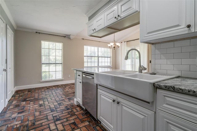 16408 Del Mar Dr, Edmond, OK 73013 - kitchen featuring dishwasher, crown molding, brick floors, backsplash, and white cabinetry