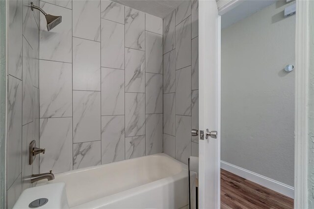 16408 Del Mar Dr, Edmond, OK 73013 - full bath featuring wood finished floors and bathing tub / shower combination