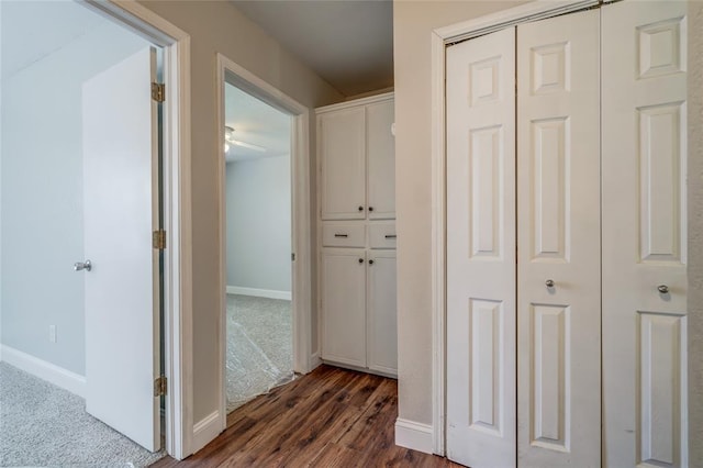 16408 Del Mar Dr, Edmond, OK 73013 - hall featuring baseboards and dark wood-style flooring