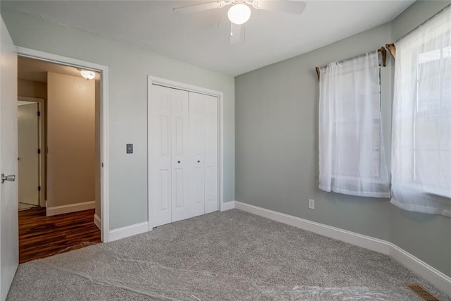 16408 Del Mar Dr, Edmond, OK 73013 - unfurnished bedroom featuring a closet, carpet flooring, and a ceiling fan